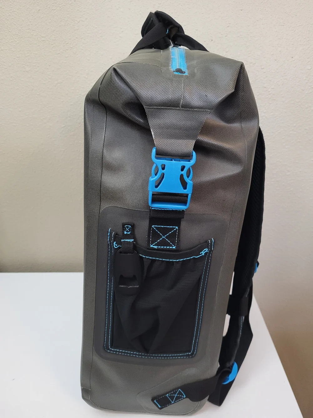Magellan Outdoors Gray Waterproof Zip Top Backpack with Blue Accents